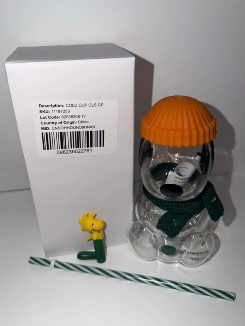 Starbucks Clear Glass Peanuts Snowman Cup with Orange Lid and Green Scarf